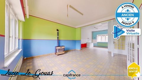 Maison individuelle de 218m² à rénover avec garage, cour et jardin