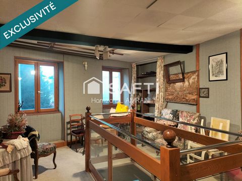 Maison de ville mitoyenne avec local commercial