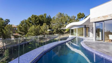 Luxury new villa Mallorca: This unique Majorca real estate with partial sea view is located in the popular Cas Catalá, in the southwest of the Mediterranean island.   This Mallorca real estate has a generous plot area of approx. 1408 m2. The new buil...