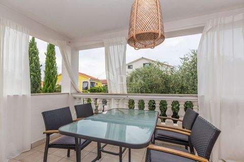 Location: Primorsko-goranska županija, Omišalj, Njivice. KRK ISLAND, NJIVICE - Ground floor of a house with two apartments This beautiful apartment is located about 450 meters from the sea. It is located in a house with several apartments on the uppe...
