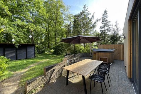 This nice holiday home in Zelhem is an ideal vacation place for your family! Located in a quaint location, the house has a hot tub where you can relax after an eventful day. Do not forget to enjoy your meals in the garden. Start your morning routine ...