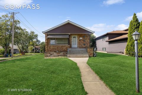Prime Location... walk to town, train, schools, parks, restaurants and shopping from this great location on fantastic block! Tear down and build new in North Downers Grove School District! Large corner lot with alley access. Existing Brick Raised Ran...