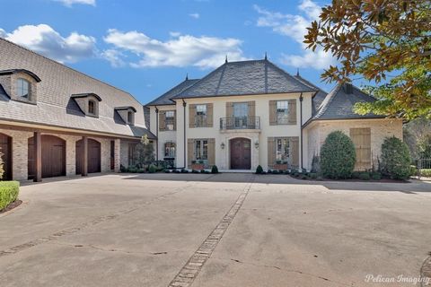 Introducing this sophisticated manor home with all the finest finishes and features.Premier location on Gilbert Drive with over 1.75 acres and gated entrance,this home offers superior craftmanship throughout.2 story entry with arched doors, formal di...
