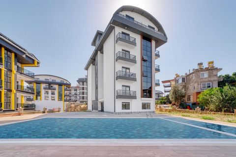 NEW AND MODERN 1+1 FURNISHED APARTMENT – HALILOGLU SITE IN ALANYA OBA! Experience comfort and peace together in a brand new apartment built in 2024! This stylish 1+1 apartment is waiting for you, located in Oba, one of the favorite areas of Alanya, i...