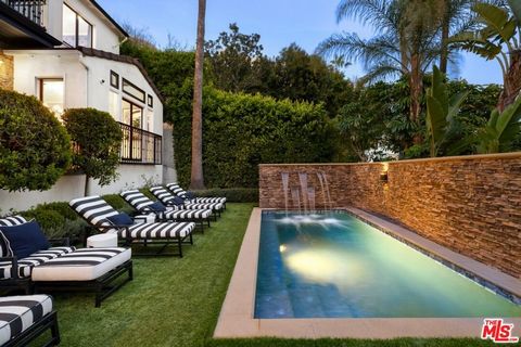 Welcome to this exquisite fully renovated 3 bedroom, 2.5 bathroom single-family residence nestled in the heart of West Hollywood, just a short walk from a martini at Sunset Tower. Large Primary Suite with 2 walk in closets and large Marble bathroom w...