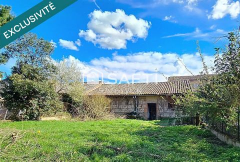 MAISON DE VILLE AVEC GARAGE ET JARDIN