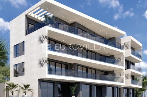 Opatija, Nova cesta, for sale a luxuriously furnished penthouse in a new building, located in a prime location in Opatija with an open sea view.The apartment marked S103 consists of a living room with a dining room and kitchen, three bedrooms, a saun...