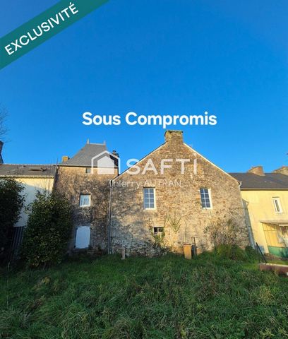 Gros potentiel pour cette maison de caractère en plein centre bourg, tout à l’égout.