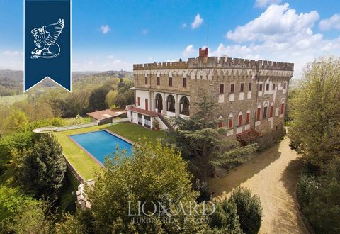 Near Florence, immersed among the Tuscan hills, is located this magnificent castle for sale. The castle spreads on three floors plus the basement, for a total area of ​​about 2,450 square meters. A large swimming pool, is located on the back of the v...