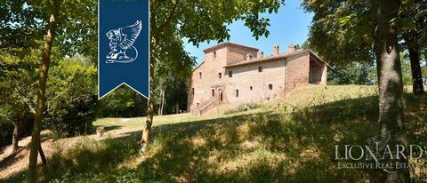 This ancient farmhouse for sale is located among the hills of Montefeltro. The property dates back to the years 1400-1500, has exposed brick exteriors and is spread over three floors plus a turret. The estate, with 600 sq m, consists of a main entran...