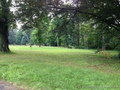 Beautiful level property with appoved five bedroom septic. Buy as land or build custom home. All engineering and drainage plans complete. Ready To Build!