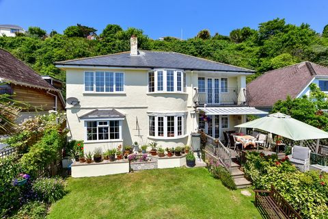 This impressive, four-bedroom property on the outskirts of the historic coastal town of Ventnor is situated in an elevated position, set back from the road, affording stunning sea views across the English Channel.   It makes an incredible first impre...