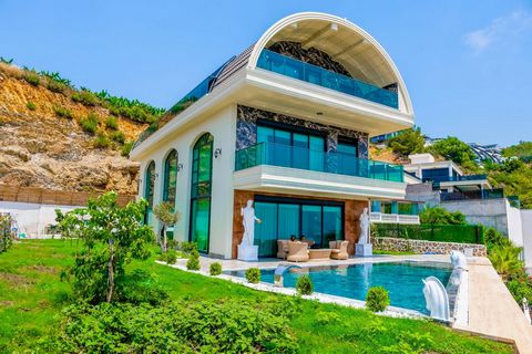 6+1 TRIPLEX VILLA MET BIJZONDERE MEUBELS EN DESIGN TE KOOP IN KARGICAK, DE OOGAPPEL VAN ALANYA   **PERCEEL: 673 M² **VILLA MET 3 VERDIEPINGEN, 6+1 LUXE DESIGN GEMEUBILEERD** Deze prachtige villa heeft een interne bewoonbare oppervlakte van 440 m², me...