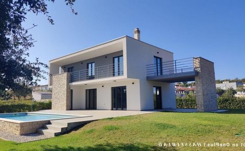 Beautiful villa in a quiet location in Porec vicinity, 6 km from the sea! Total area is 144 sq.m. Land plot is 942 sq.m. On the ground floor, you'll find a spacious living room that seamlessly integrates with an open kitchen and dining area, as well ...