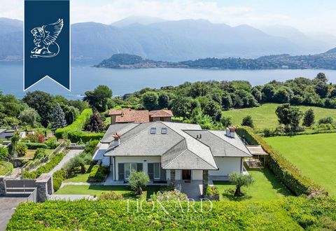 A Griante, tra le zone più esclusive della Tremezzina nello splendido scenario del Lago di Como, è in vendita questa villa moderna con piscina e ampio giardino che contempla una vista esclusiva sulla celebre Bellagio. Immersa in un incantevole giardi...