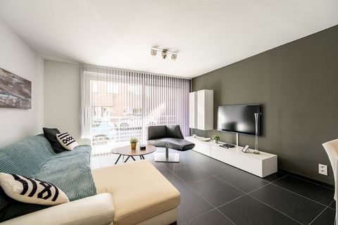 Step into urban comfort with a coastal twist at this spacious ground-floor apartment, ideally located on Stationstraat just moments from the heart of Blankenberge. With its blend of city views, modern design, and thoughtful amenities, this home-away-...