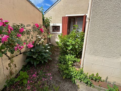 Maison de ville avec garage et jardin