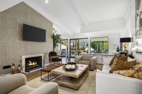 NEW PRICE! $75K Adjustment! Stylish Updated Condo! Elevated above a greenbelt with pool & mountain views, this 3 bedroom/3 bathroom condo is located on a cul-de-sac in Desert Horizons CC in Indian Wells CA. The new front door beautifully frames the e...