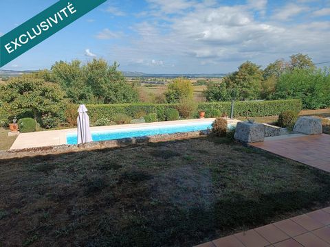 maison avec piscine au cœur d'un village dynamique