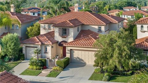 Nestled in the iconic hills of San Juan Capistrano, in the sought after neighborhood of San Juan Hills, you will discover this spectacular home that offers an abundance of desirable features. As you approach the entry along the extended patio, you ar...