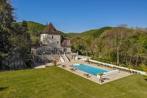 Summary Rare find - This property is a former manor house on the banks of the river Lot, set on 3,7 hectares. The Manor is surrounded by an oasis of greenery, water and tranquility. From the large terrace, on the first floor, you have a beautiful vie...