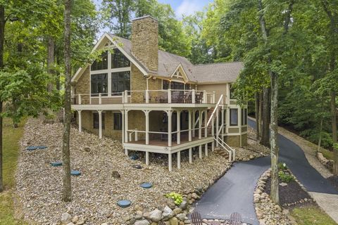 Are you ready for lake life? This stunning home on Racoon Lake nestled on a gorgeous waterfront lot is waiting for YOU! Enjoy this home year round and every season. Breathtaking views in winter, spring, summer and fall. This home offers an unparallel...