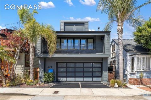 À seulement trois pâtés de maisons de la plage, le 417 30th Street est une superbe retraite à Hermosa Beach qui allie harmonieusement style contemporain et élégance côtière. Conçue par la célèbre architecte d’intérieur Anne Carr, cette maison bénéfic...