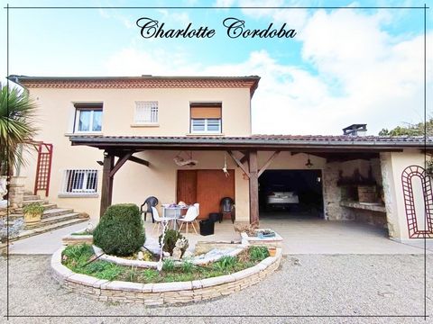 Maison familiale avec grand terrain, sous-sol aménagé, garages et terrasse sur 13104 m² de terrain