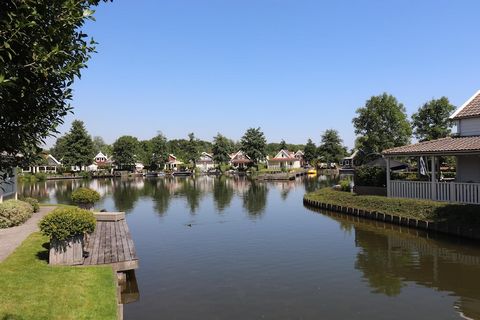 Lakeside Tranquility with Modern Comfort Tucked away in the serene Zuytland Buiten park, this charming waterside bungalow offers the perfect escape into nature. Wake up to peaceful lake views, sip your morning coffee on the private terrace, and cast ...