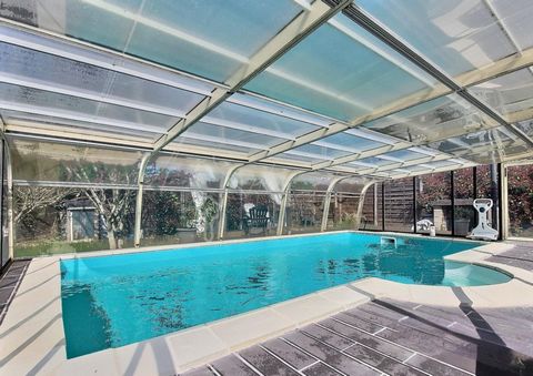 Maison individuelle avec piscine, jardin et garage