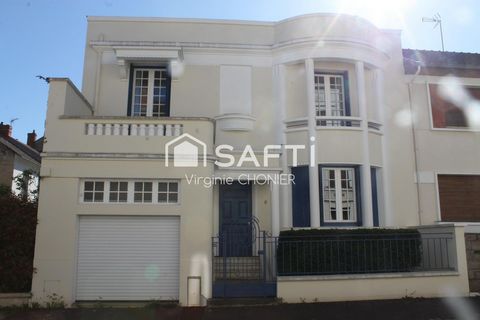 Magnifique maison avec garage, jardin et terrasses. Quartier prisé
