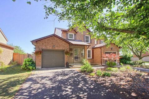 This Stunning 3 Bedroom Freehold Semi-Detached Home Backing Onto Greenspace On A Quite Family Friendly Street In River Oaks Close To Great Schools, Parks, Scenic Trails, Shopping And More! Spacious Living Room And Separate Dining Room Both With Hardw...
