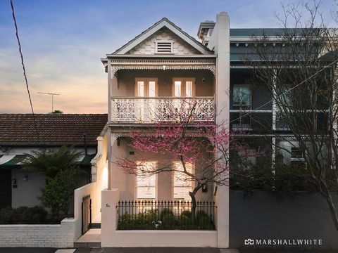 Exceptionally designed and enviably placed, this inspired residence brings architectural indulgence and quality to a prized location in the heart of Albert Park Village. Nestled within a quiet and exclusive street yet celebrating an effortless indoor...