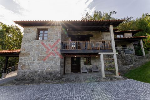 Casa da Cerca, inserted in a rustic environment. It is situated between the Monastery of Santa Maria de Bouro and the Caniçada dam, near the Peneda-Gerês National Park. 1 Km from the Caniçada Dam, 1 Km from the beautiful River Beach of Parada de Bour...