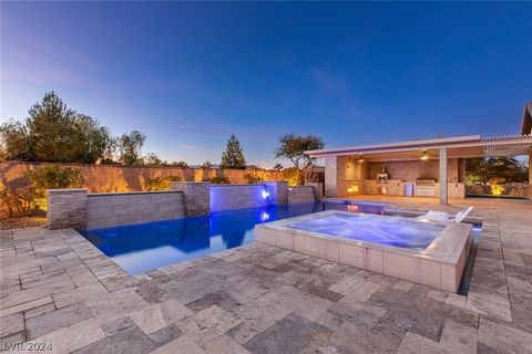 This exceptional semi-custom single-story gated residence nestled in the Southwest showcases a spacious and functional layout. This Luxurious home comes fully furnished, with high-end finishes. The kitchen boasts granite countertops, Electrolux stain...