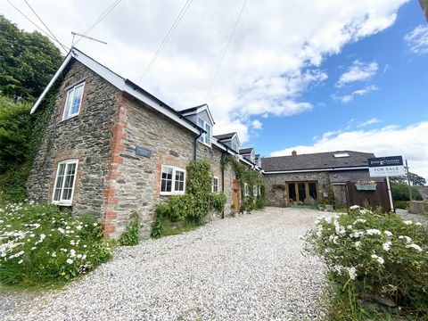 Whitehall Lodge is approached via a private gravelled drive which provides ample parking for several vehicles. There is also small stone barn and a fenced store for the recycling bins and oil tank. The property is accessed via the front door which le...