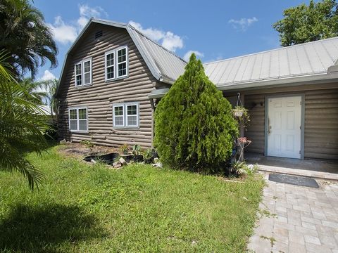 Charming multi-generational log home on a spacious .46-acre lot. The main house features 3 bedrooms, 2 bathrooms, an oversized master bedroom, and impact windows and entry doors. It needs some repairs, offering a great opportunity to add personal tou...