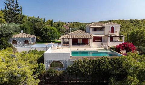 GADAIT international presents this exceptional villa in Porto Heli, on the Greek Riviera. Set in a vast 4,000 m² plot, this residence combines the timeless charm of stone with exceptional modern comfort, with 450 m² of living space. The first floor w...