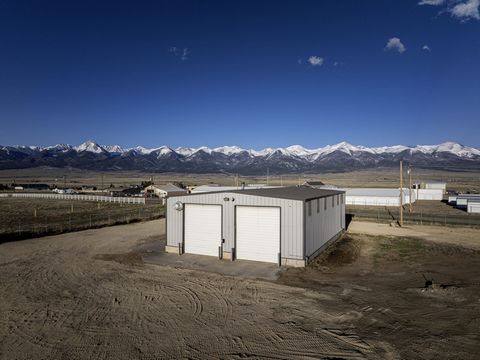 Commercial/Industrial building: Located in the vibrant Town of Westcliffe, this commercial building sits on a prime 1.95-acre parcel of land. The property benefits from a commercial well that produces an impressive 15 gallons per minute, a rare and v...