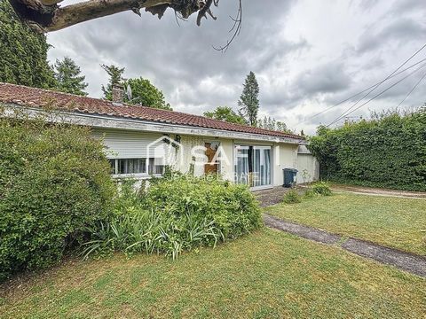 Maison de plain-pied avec garage et jardin clos