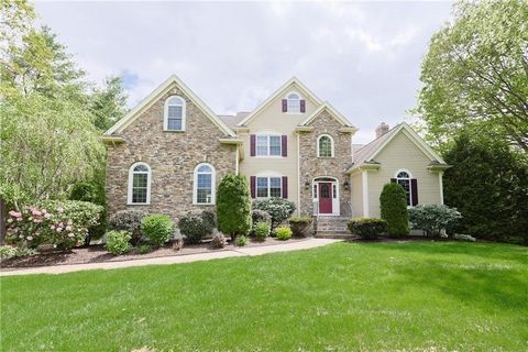 This distinctive home offers a unique blend of quality, thoughtful design, and comfort.Enter the spacious foyer and be greeted by elegant finishes, soaring ceilings, and abundant natural light. The heart of the home is the dramatic two-story Family R...