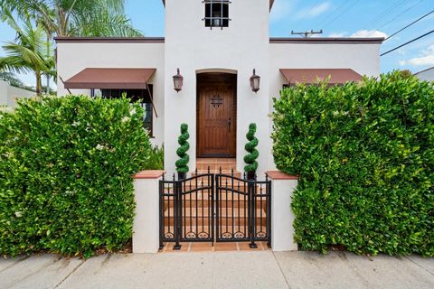 Exquisitely reimagined and custom-remodeled, this 1924 Spanish home sits on a quiet street behind motorized wrought iron gates in the heart of West Hollywood. Every inch of this designer residence has been thoughtfully curated, blending timeless arch...