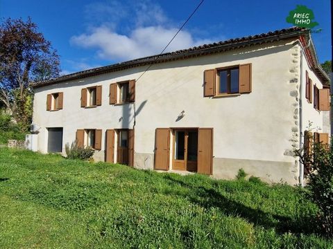 Maison en pierre avec jardin et garage