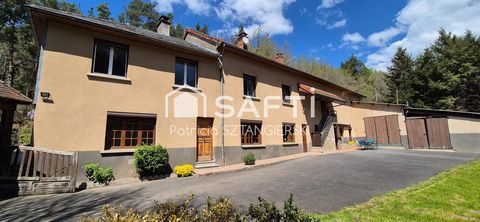 Belle maison familiale rénovée T7 avec grande surface de garages et parcelles jardin et bois.